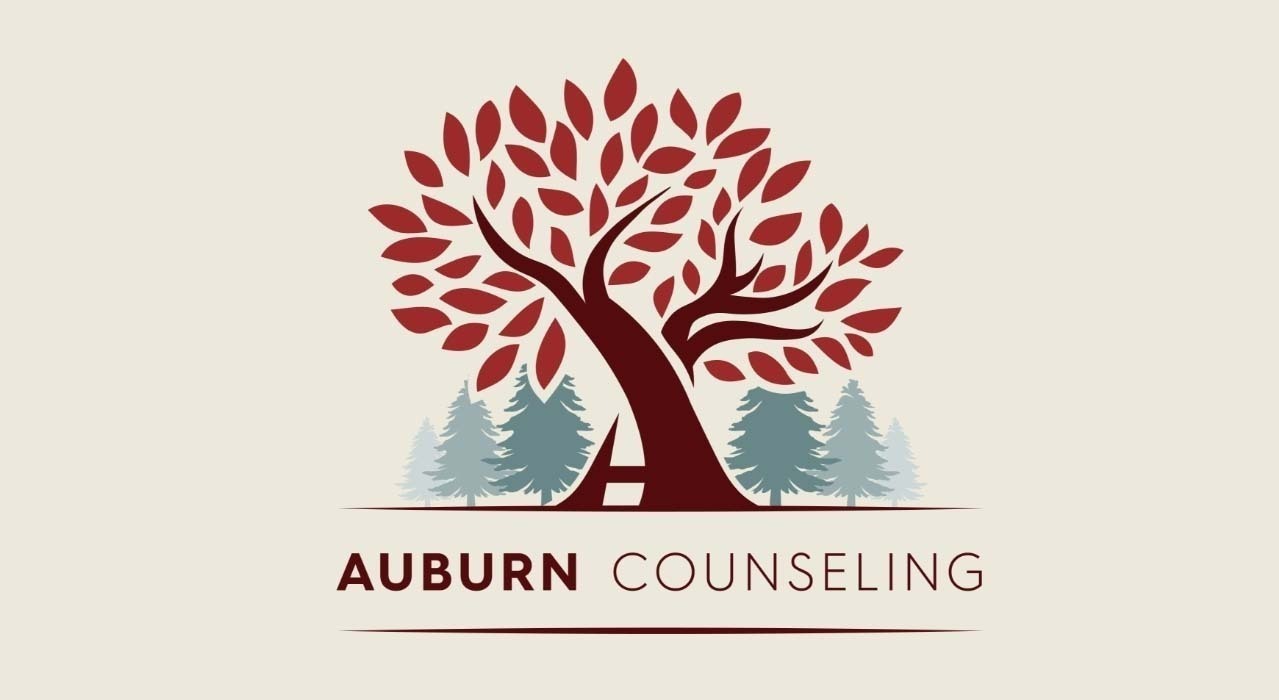Auburn Counseling logo - one big tree with 3 small trees on each side.